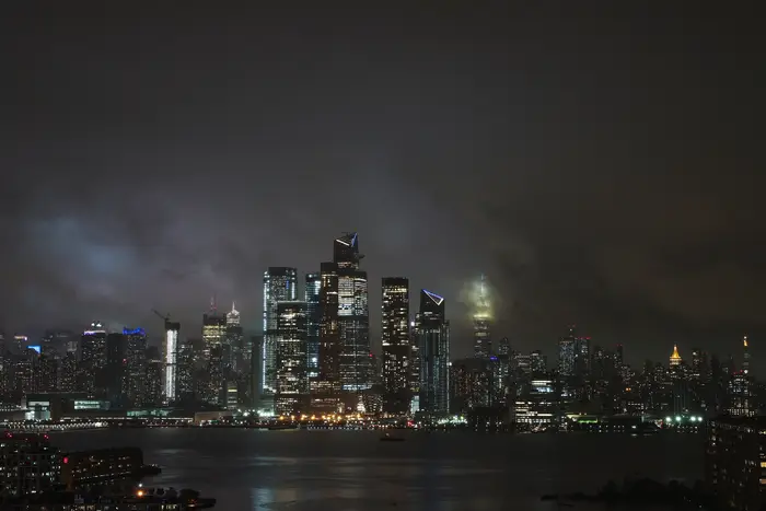 Huge clouds illuminated by Manhattan at night during stormy weather, September 23rd, 2021.
